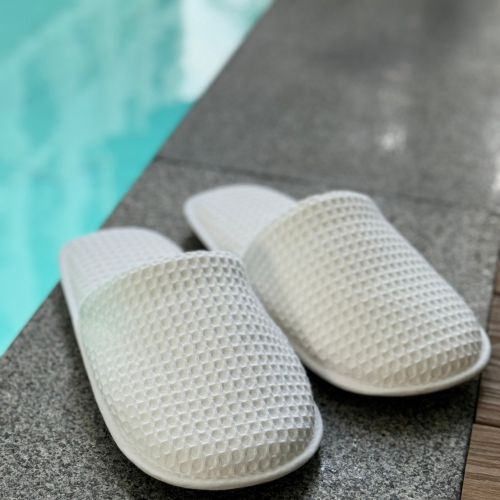 เสื้อคลุมอาบน้ำและรองเท้าสลิปเปอร์